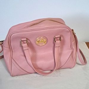 Juicy Couture medium purse with strap to convert crossbody pink bag.